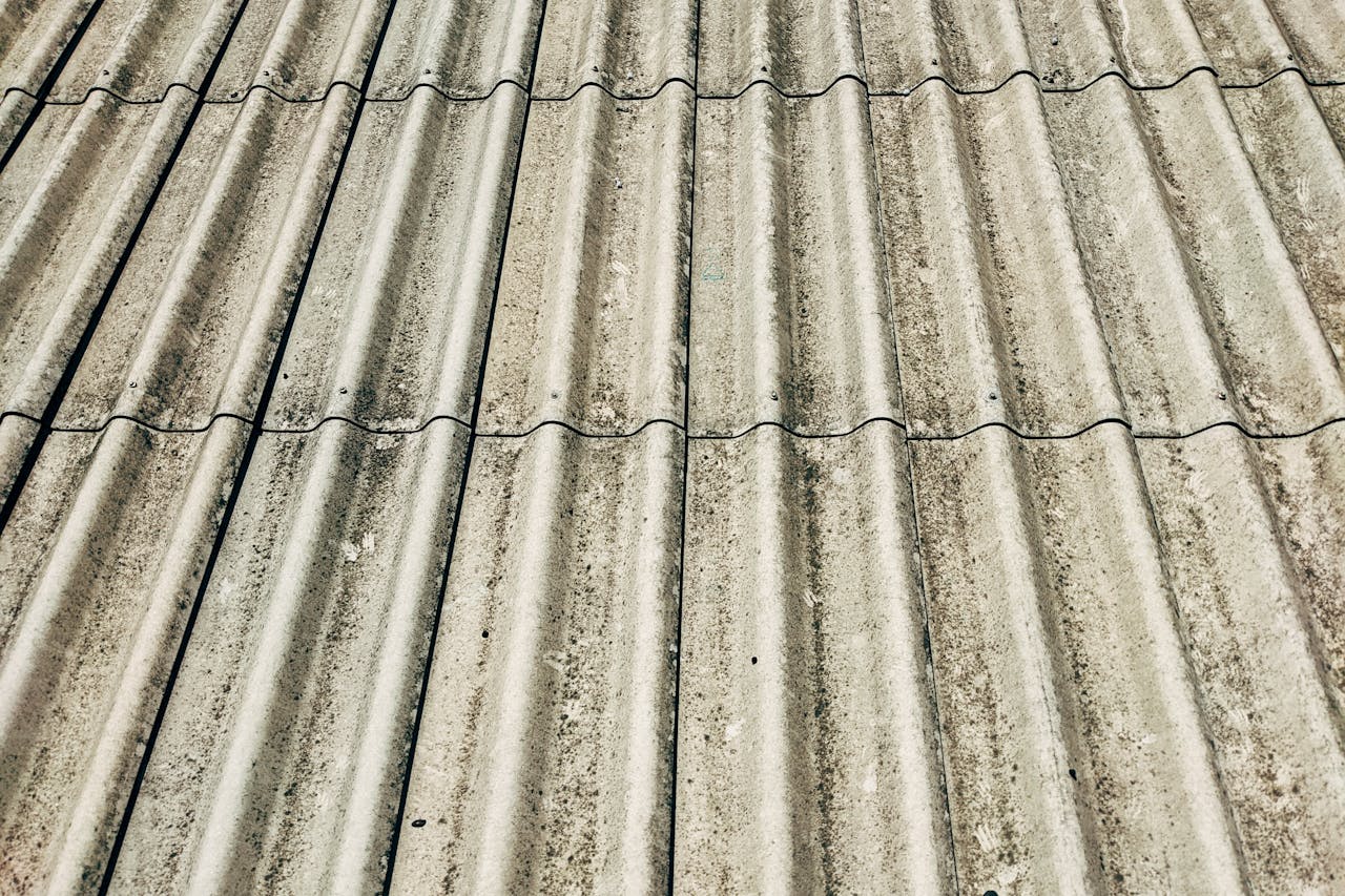 Detailed close-up of a corrugated concrete roof showcasing texture and pattern.